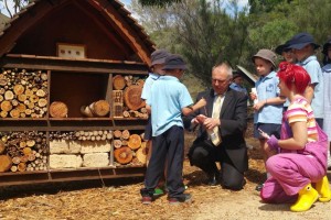 Dr Gordon de Brouwer Secretary for the Department of the Environment with Maribyrong Primary students making mini bee hotels  